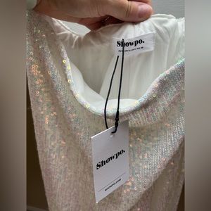 White sequin bell bottom pants from Showpo never worn!